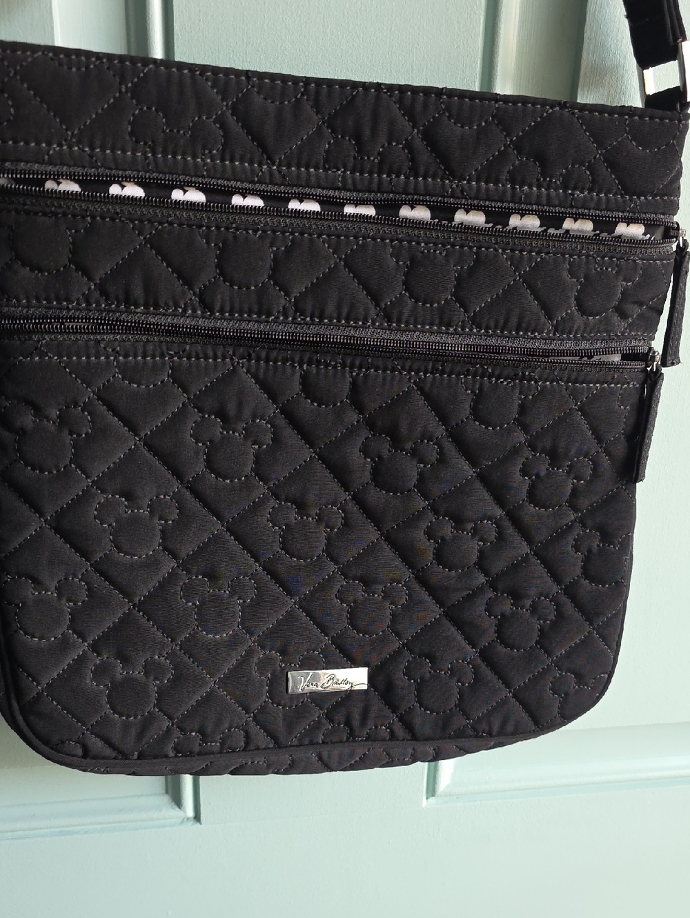 Vera Bradley Disney Black Quilted Crossbody with Mickey Pattern.